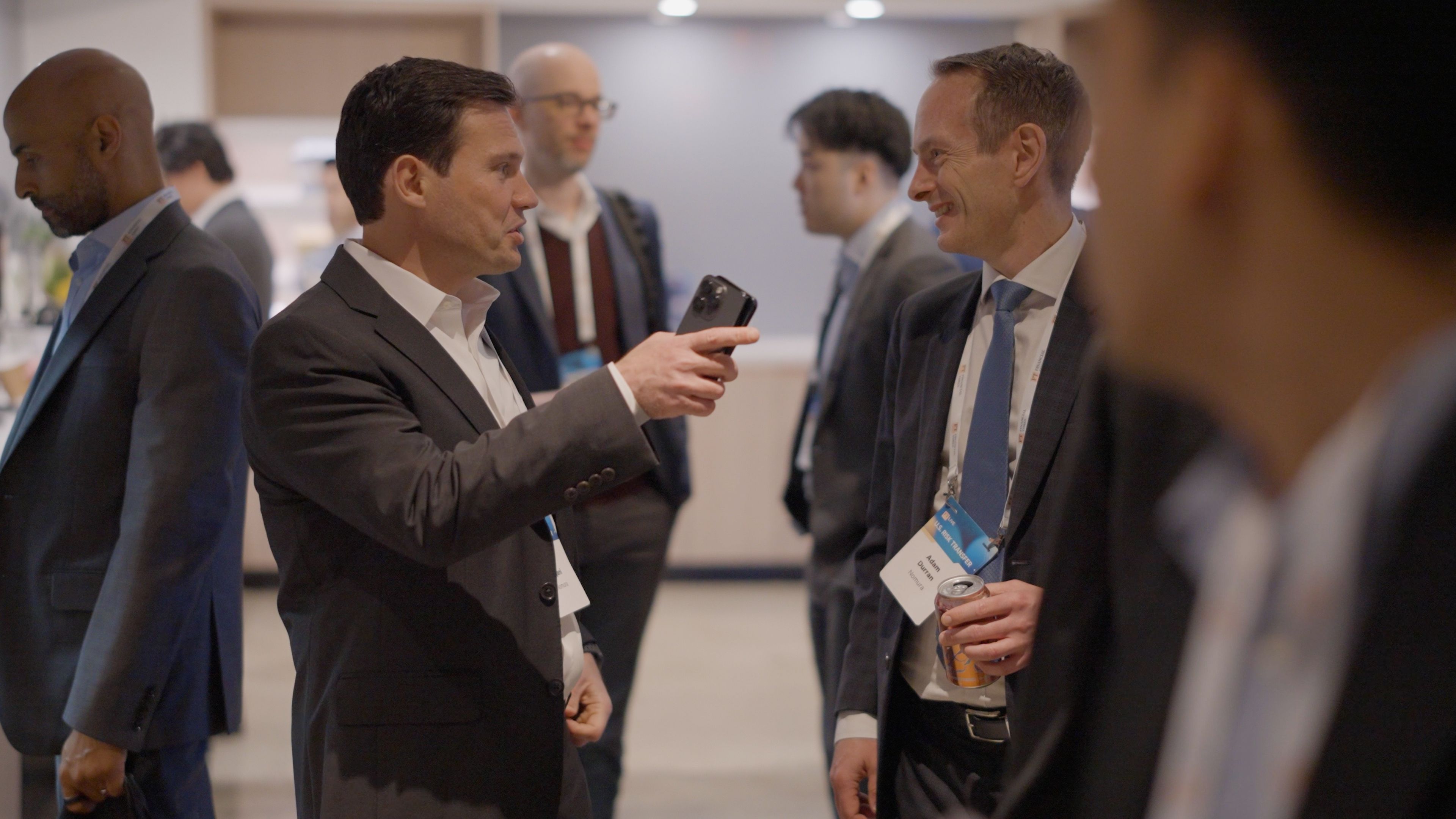 Attendees shaking hands