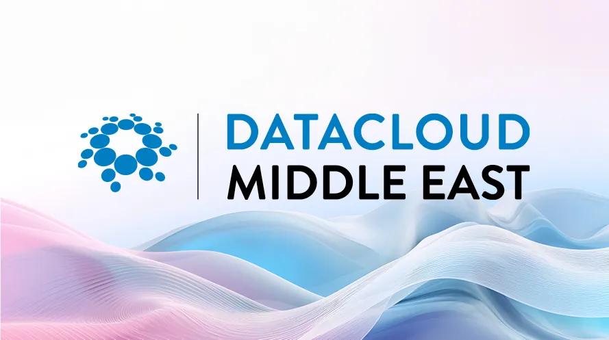 Event graphic for Datacloud Middle East featuring a blue circular bubble logo alongside text reading 'DATACLOUD MIDDLE EAST'. Set against a background of flowing abstract waves in shades of pink, purple, and blue.