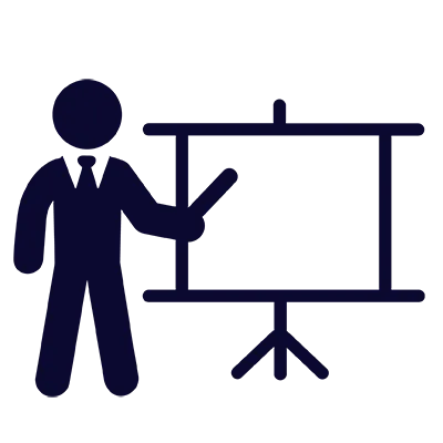 A person in business attire using a pointer stick next to a presentation easel, representing a workshop or presentation.