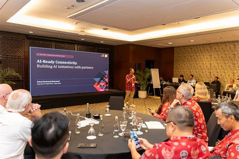 AI-ready connectivity session at GLF Batic in Bali. A room full of people listening to Faizal Rochmad Djoemadi