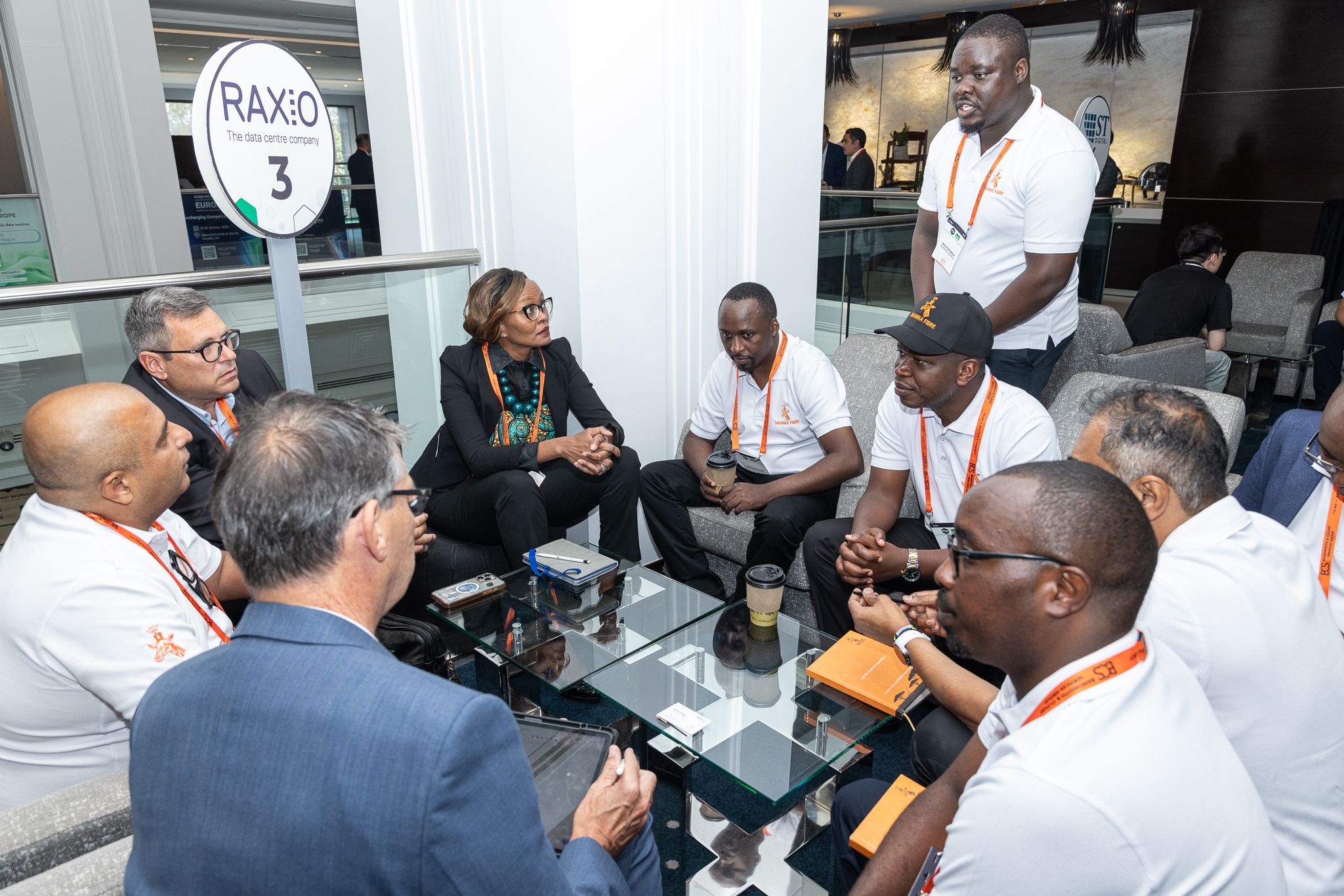 a group of people in a meeting