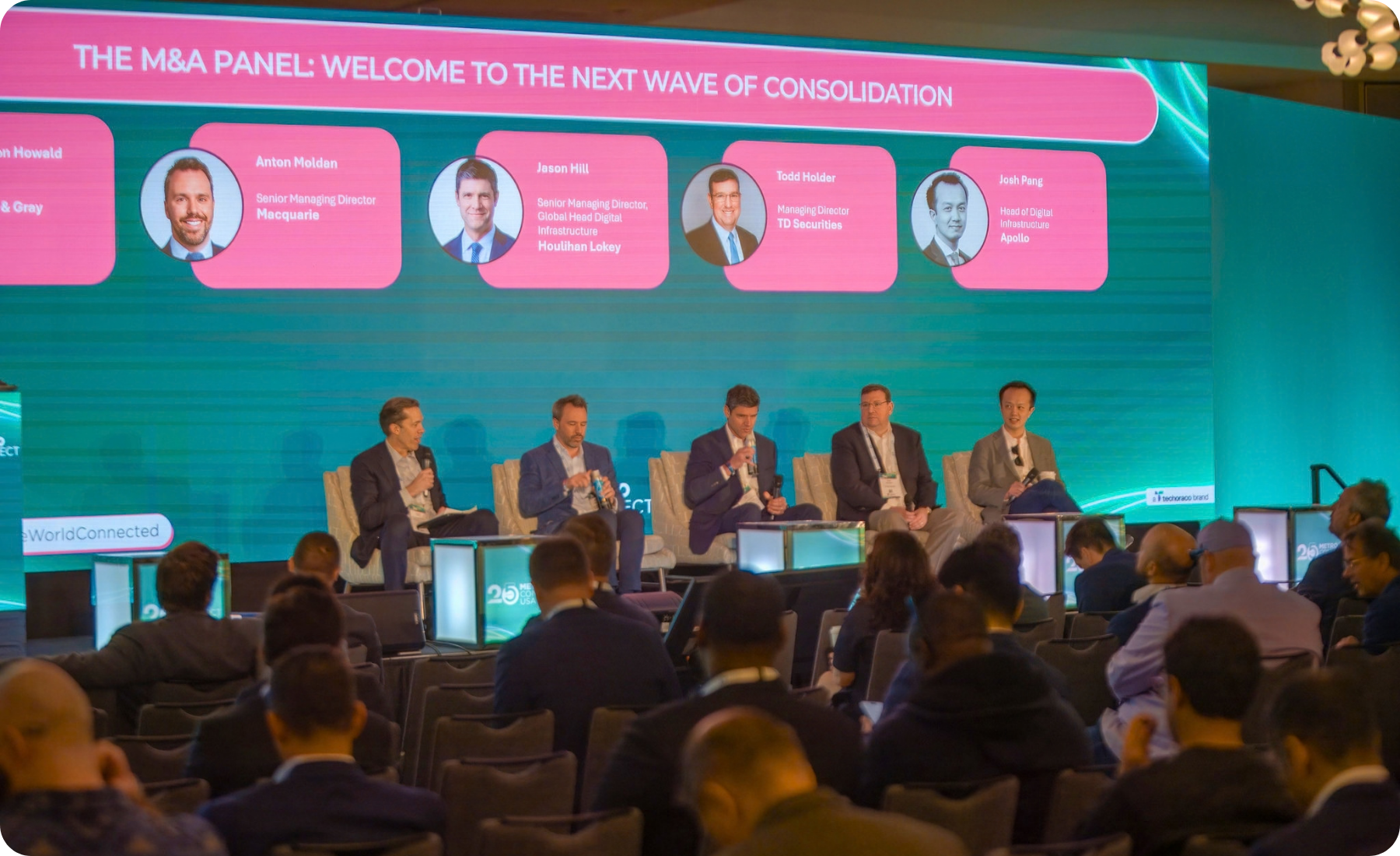 Finance and investor leaders on stage at Metro Connect USA
