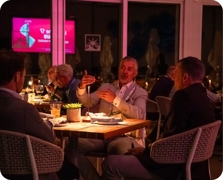 Professionals having dinner and talking at one of the private dinners from earlier this year at Metro Connect USA.