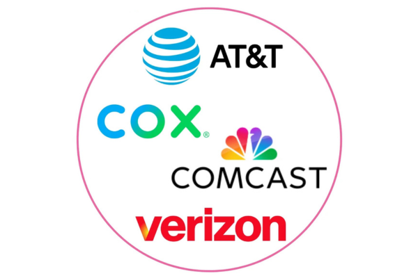 A circular graphic with a thin pink border enclosing the corporate logos of four major American internet service providers and telecommunications companies: AT&T, Cox, Comcast, and Verizon.