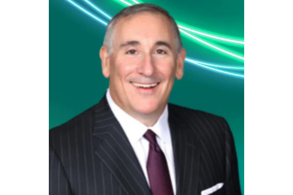 Professional headshot Alex Gellman with short grey-brown hair, wearing a dark pinstripe suit, a white shirt, and a dark purple tie. The background is teal with glowing green and white abstract lines curving across the top.