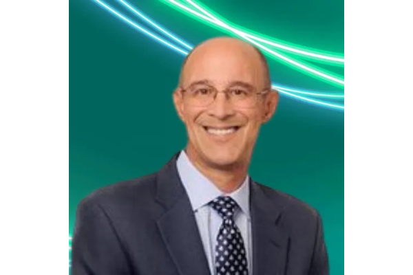 Professional headshot of Ronald J. Mudry with glasses, wearing a dark suit, light blue shirt, and a dark, patterned tie. The background is solid teal with glowing green and white abstract lines curving across the top.