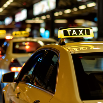 By Taxi / Ride-hailing
