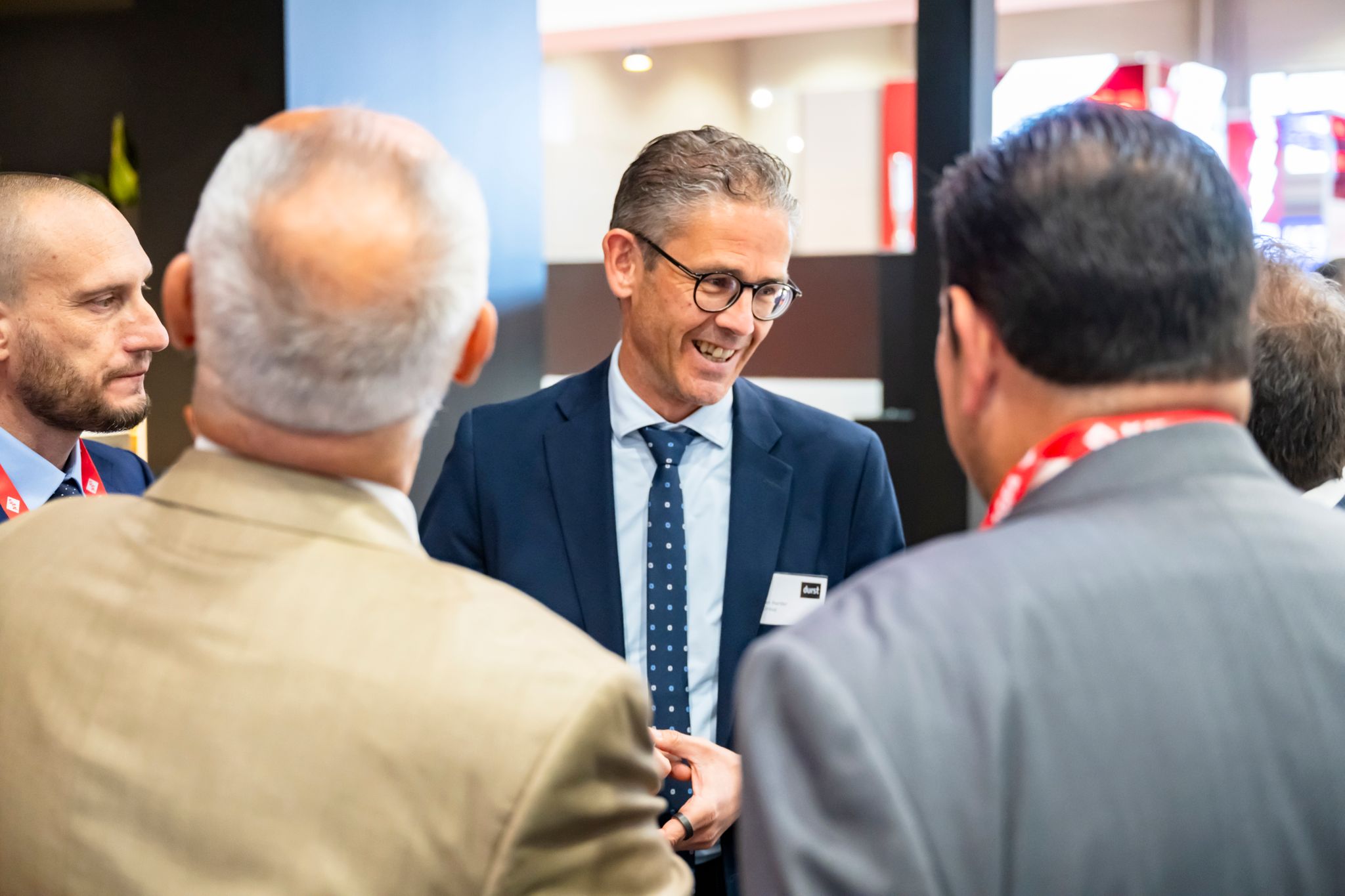 Business people at an exhibition doing business