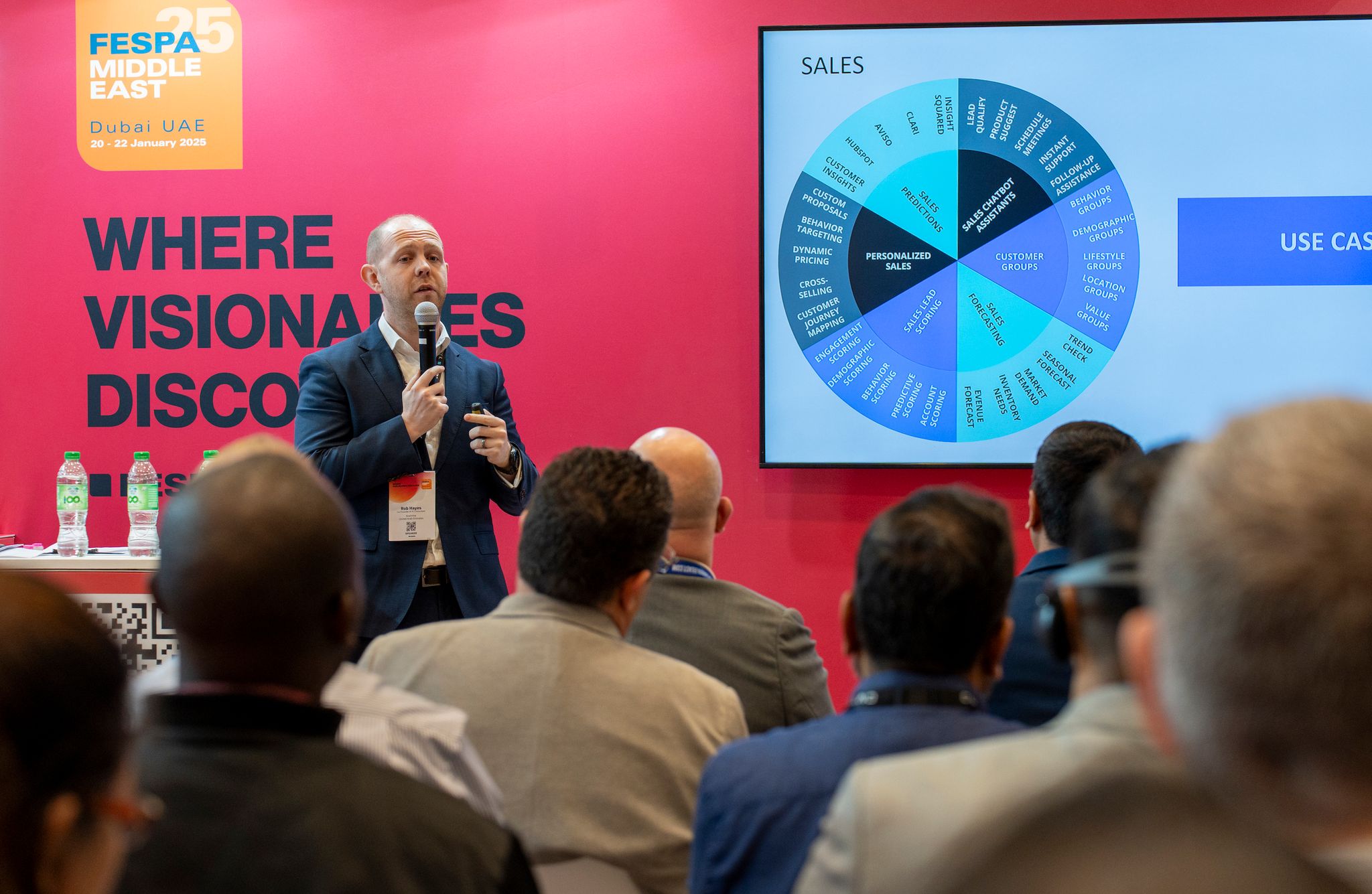 Professional giving a conference session at an exhibition