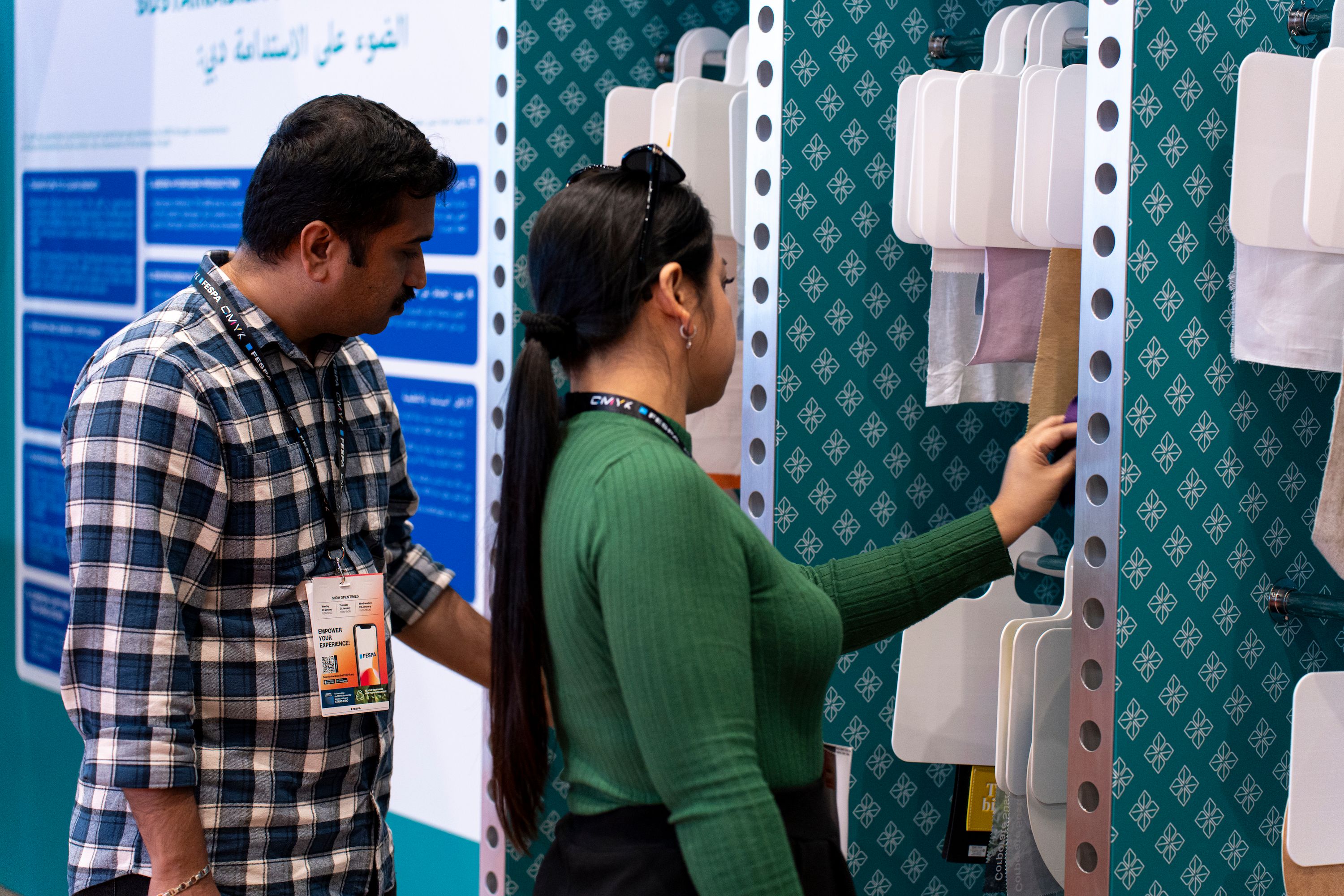 Visitors looking at sustainable product samples