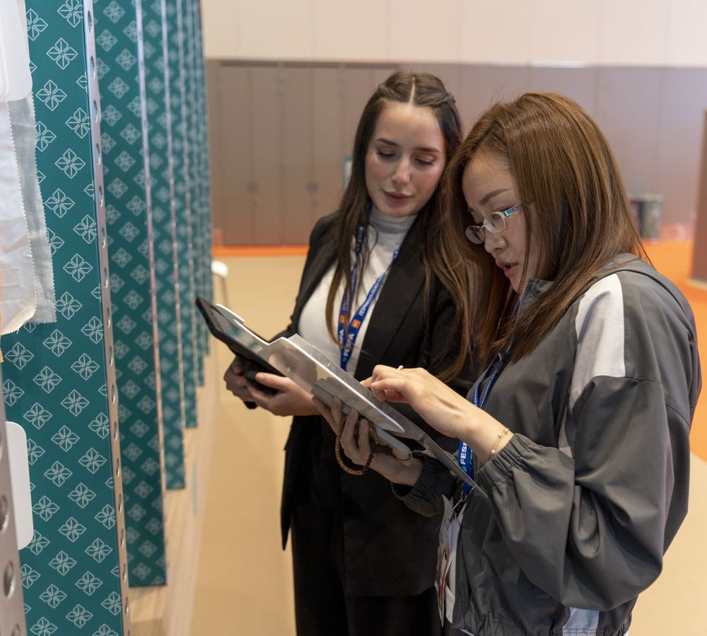 Visitor looking at Sustainability Spotlight materials