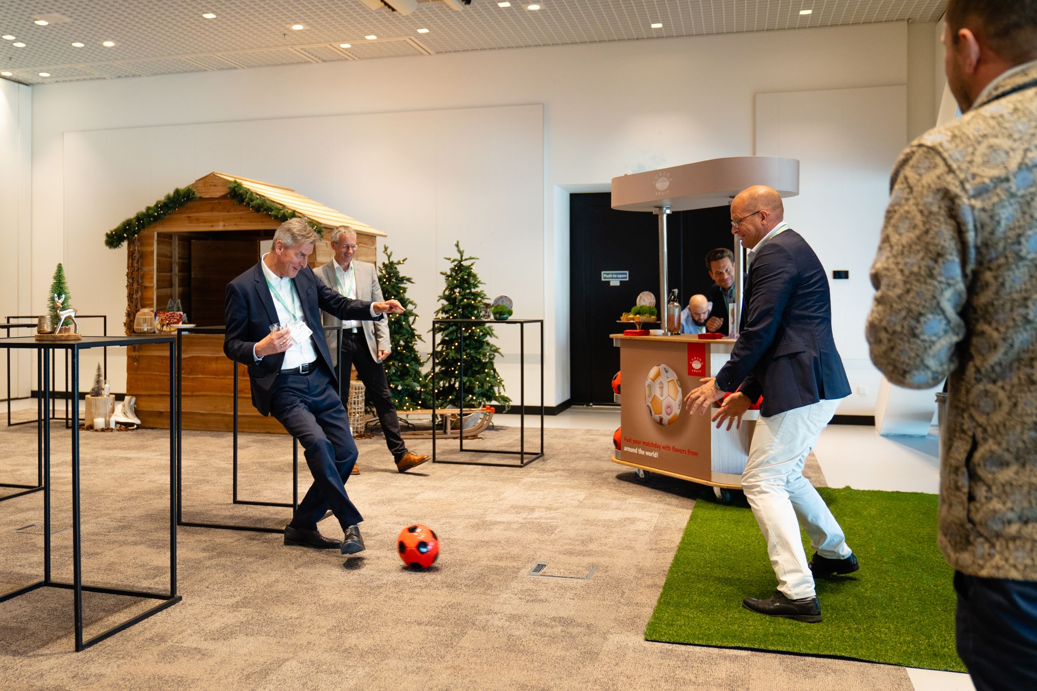 men playing football indoors