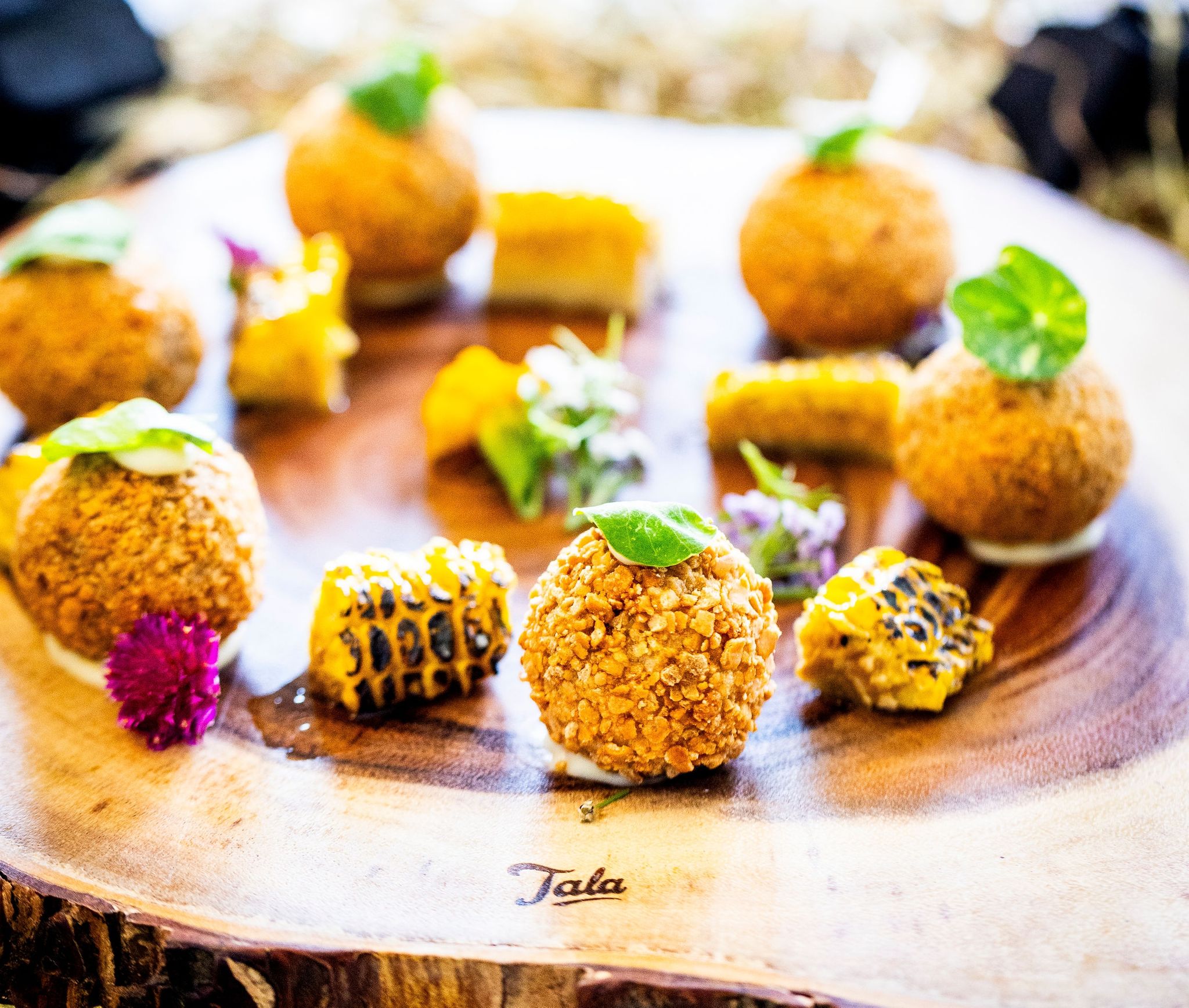 corn and falafels on a place