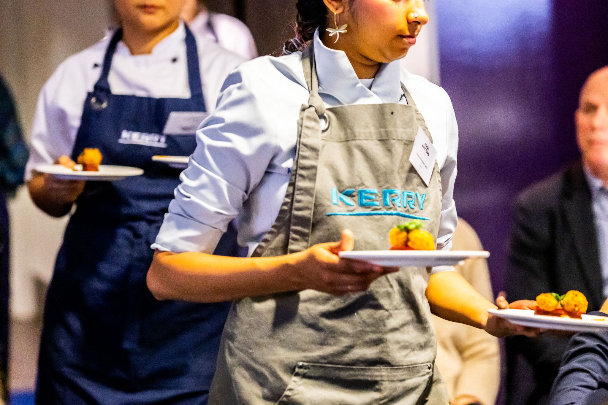 waiting staff serving food