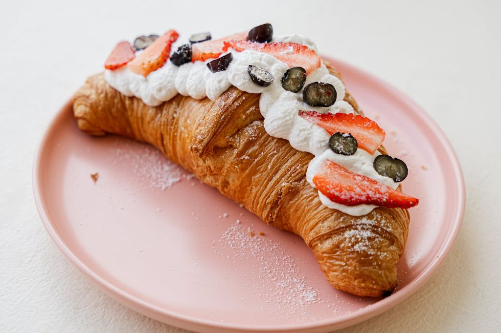 croissant with cream on top