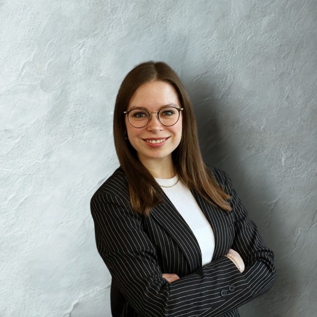 Woman in glasses smiling