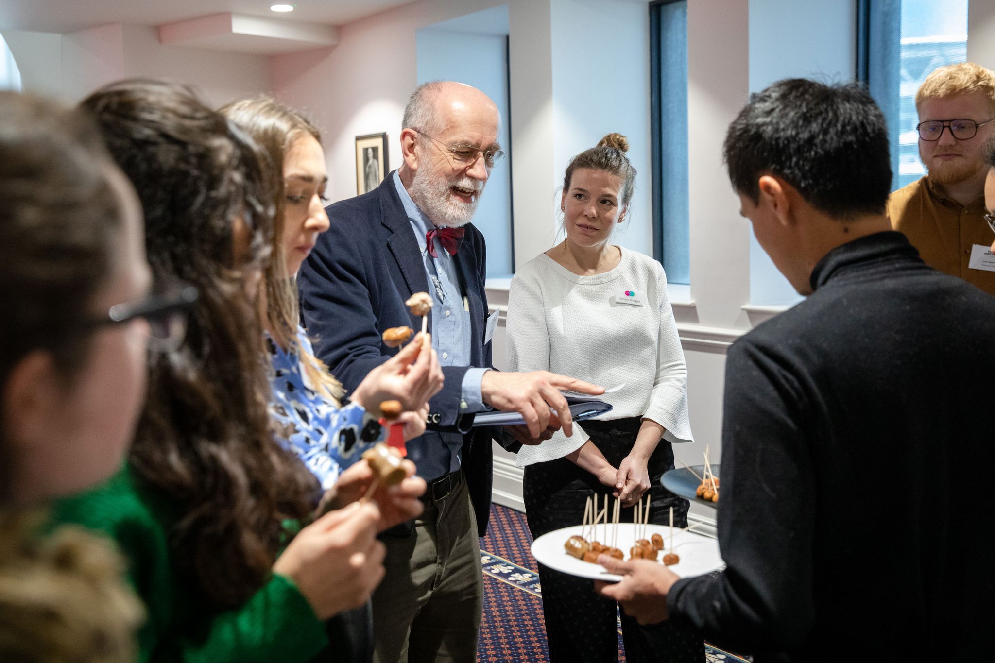 people sampling food