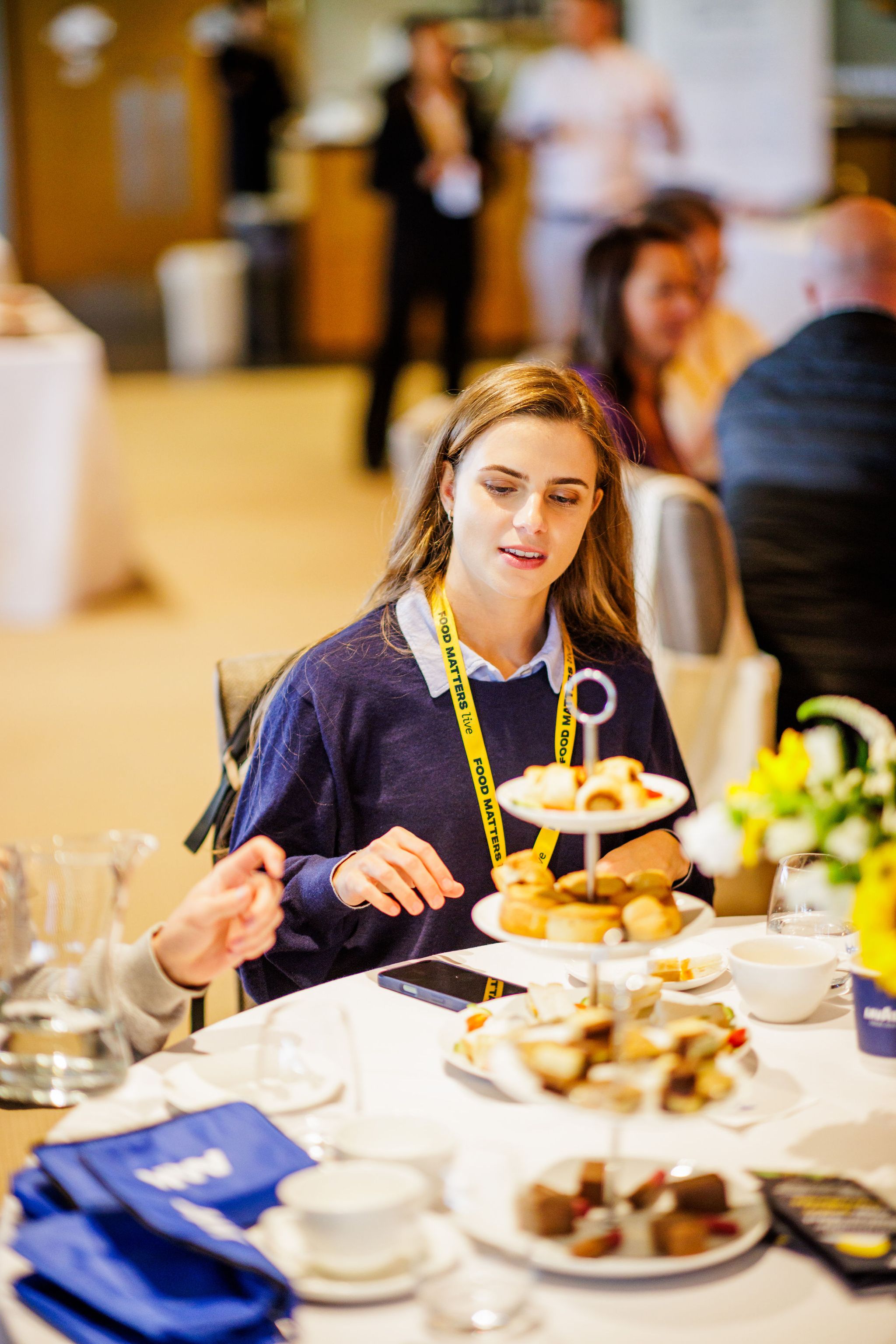 woman sat at a table