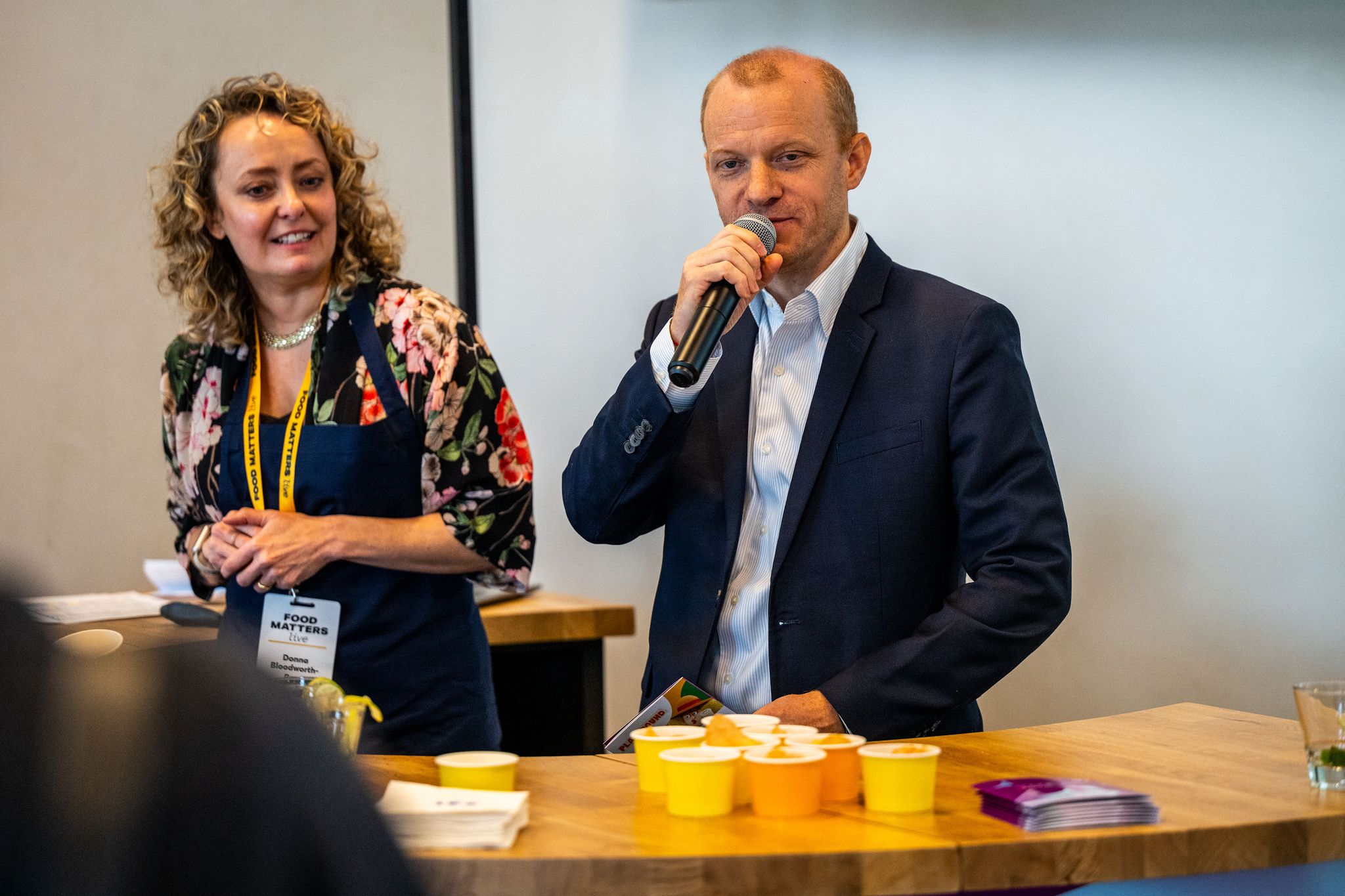 people at an event speaking