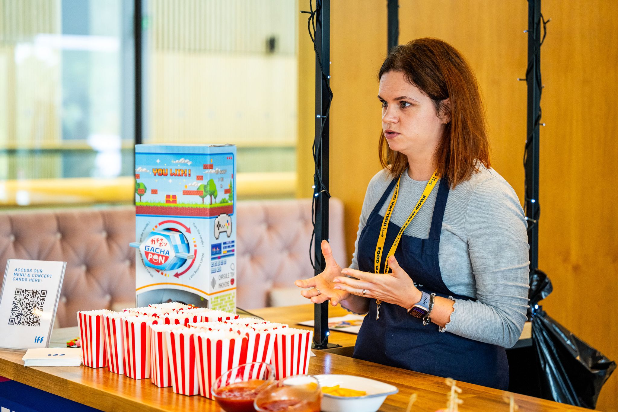 woman at a popcorn stand