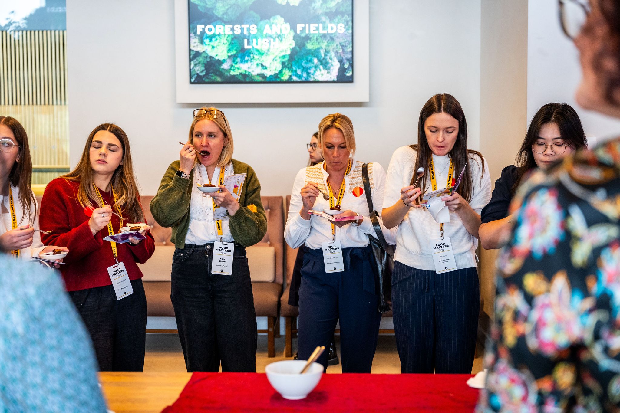 people sampling food