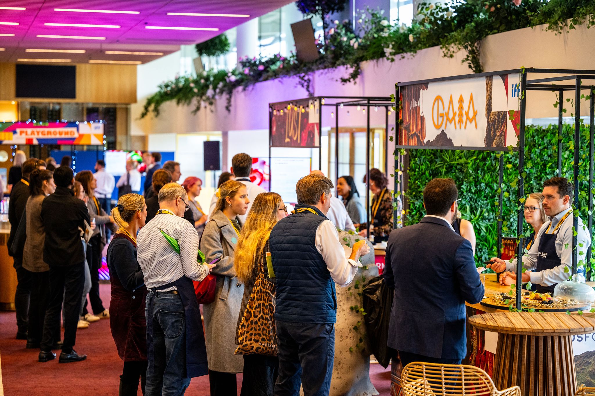 people at an event stand