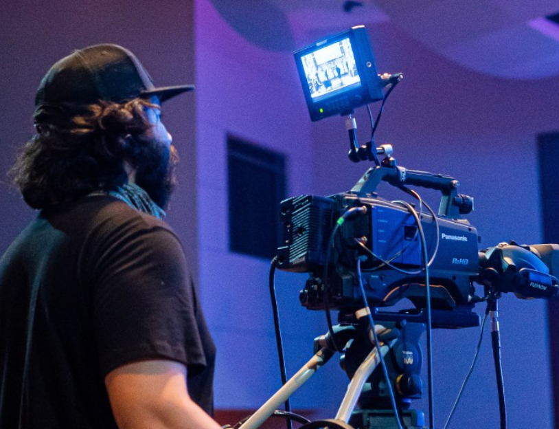 Cameraman operating camera