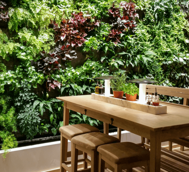 A garden setting with cafe table