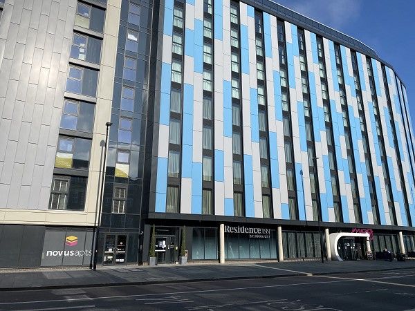 Front view of Marriott Moxy and Residence Inn Slough hotel, featuring sustainable design and Baxi heating solutions