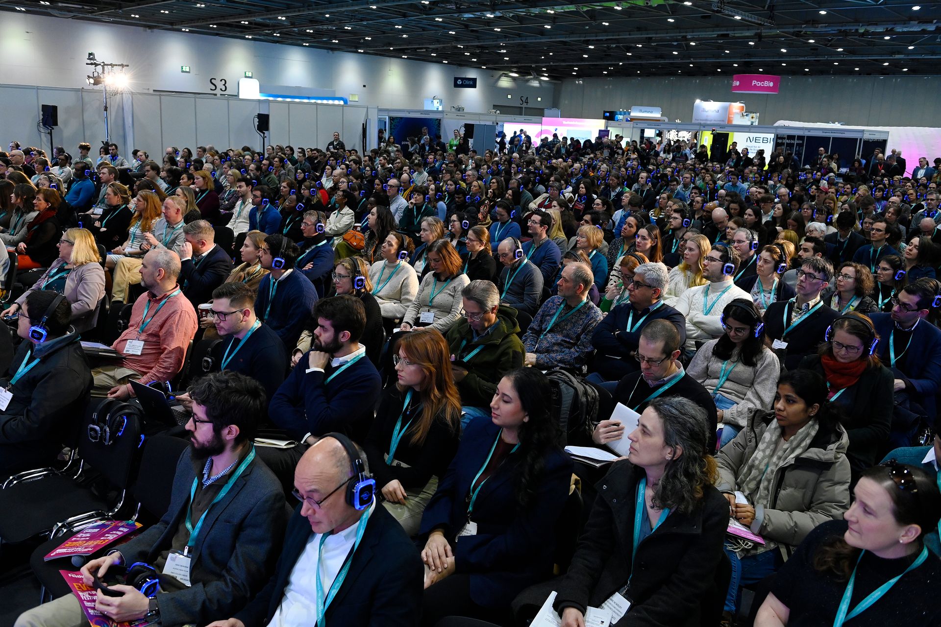 crowed people sitting