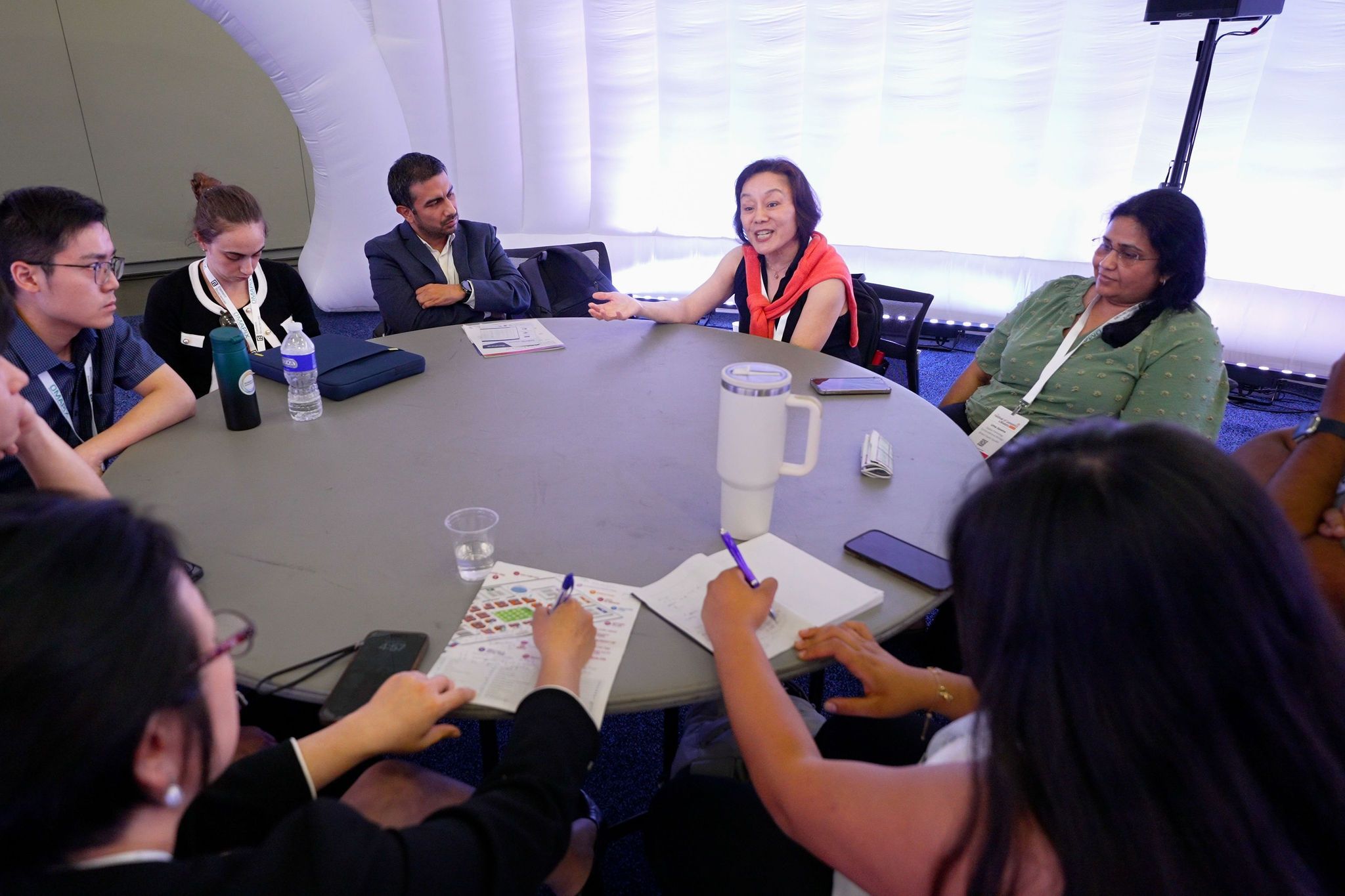 People sat at a roundtable workshop