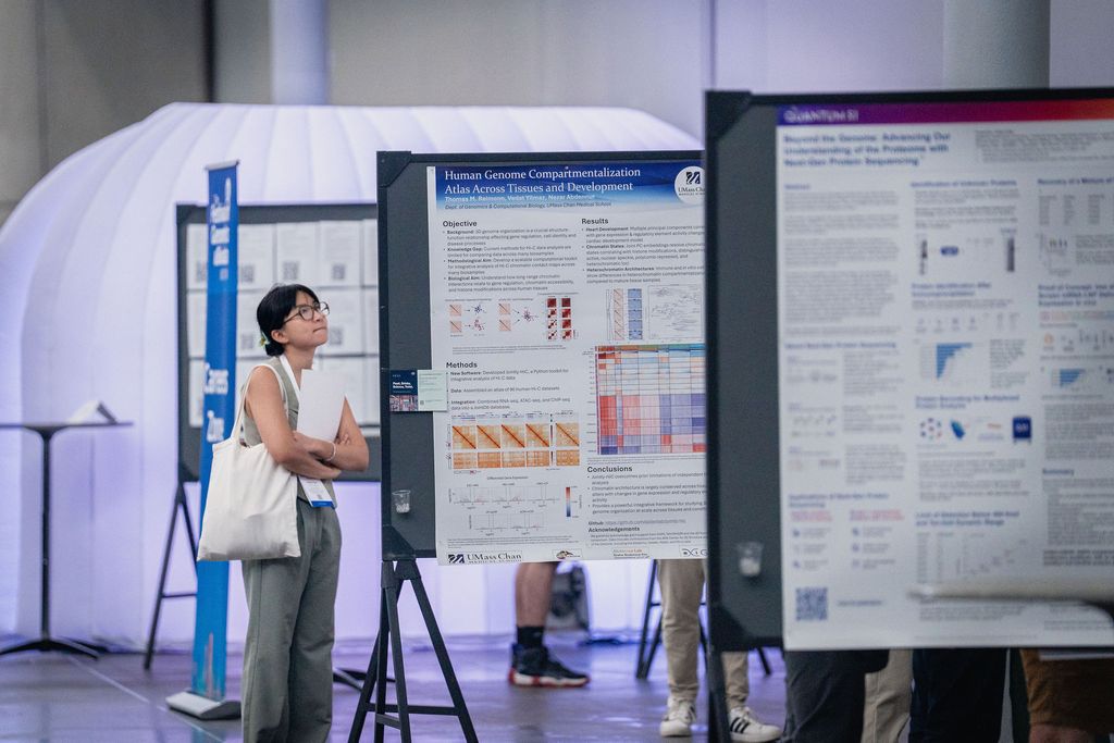 Lady looking at Poster Zone