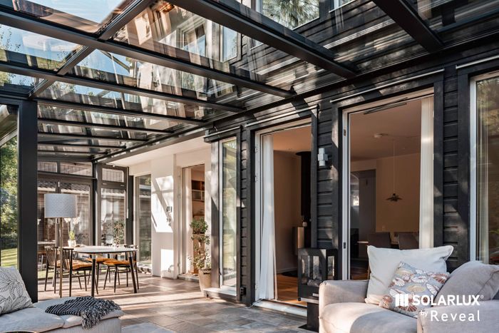 Glass Home Extensions: Light-Filled Living Spaces