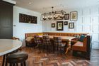 Hand-crafted kitchen and banquette seating area