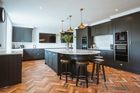 Hand-crafted kitchen and banquette seating area