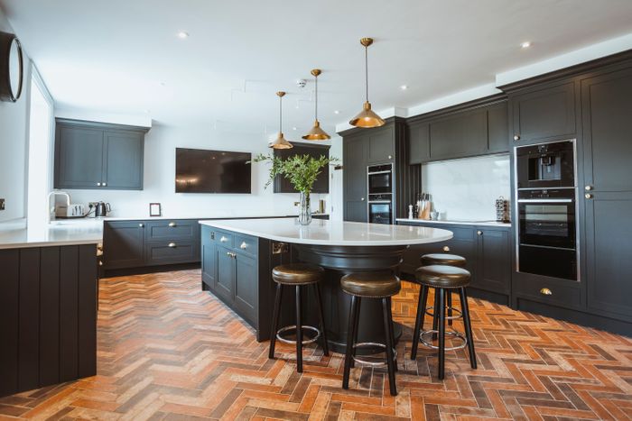 Hand-crafted kitchen and banquette seating area