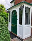 New wooden porch using the existing doors - replicating the original period design.