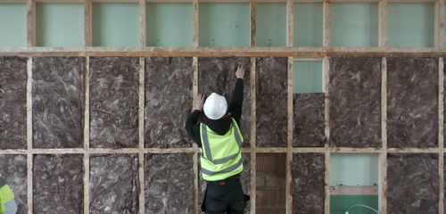 Insulating Internal Walls in a Local Community House