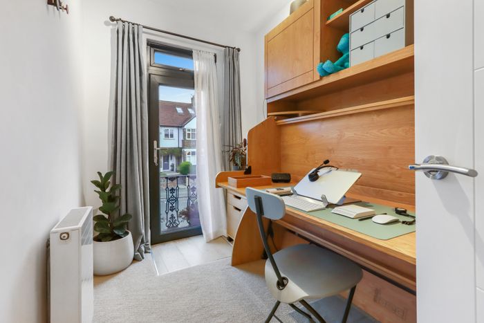 Universal StudyBed in light oak finish