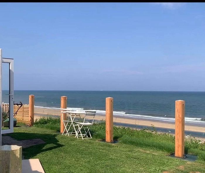 Timber Post & Glass Balustrades | Natural Oak & Clear Glass