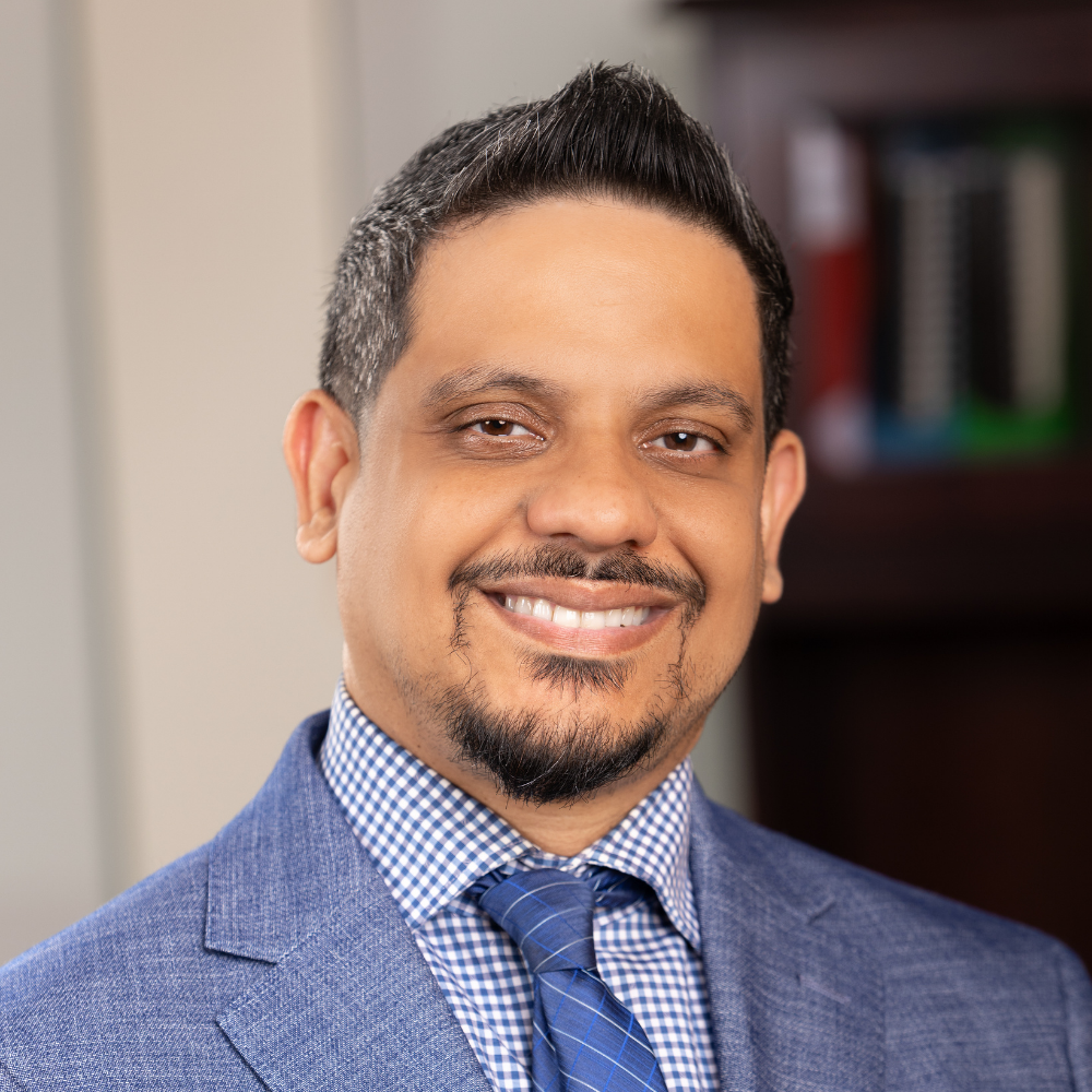 Dr. Damie Sinanan