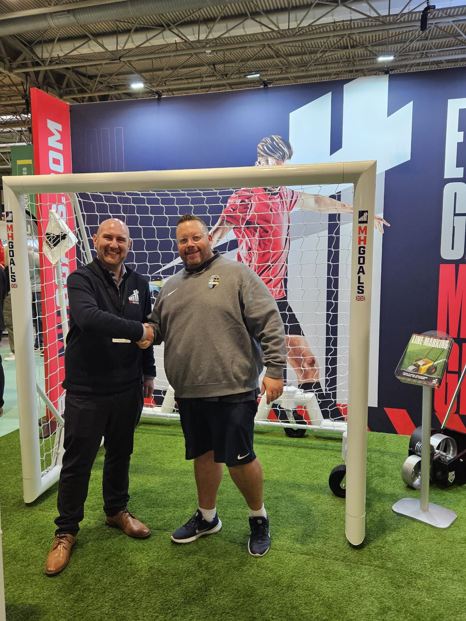 Surrey FA And MH Goals Shake Hands on Three-Year Partnership at SALTEX 2024