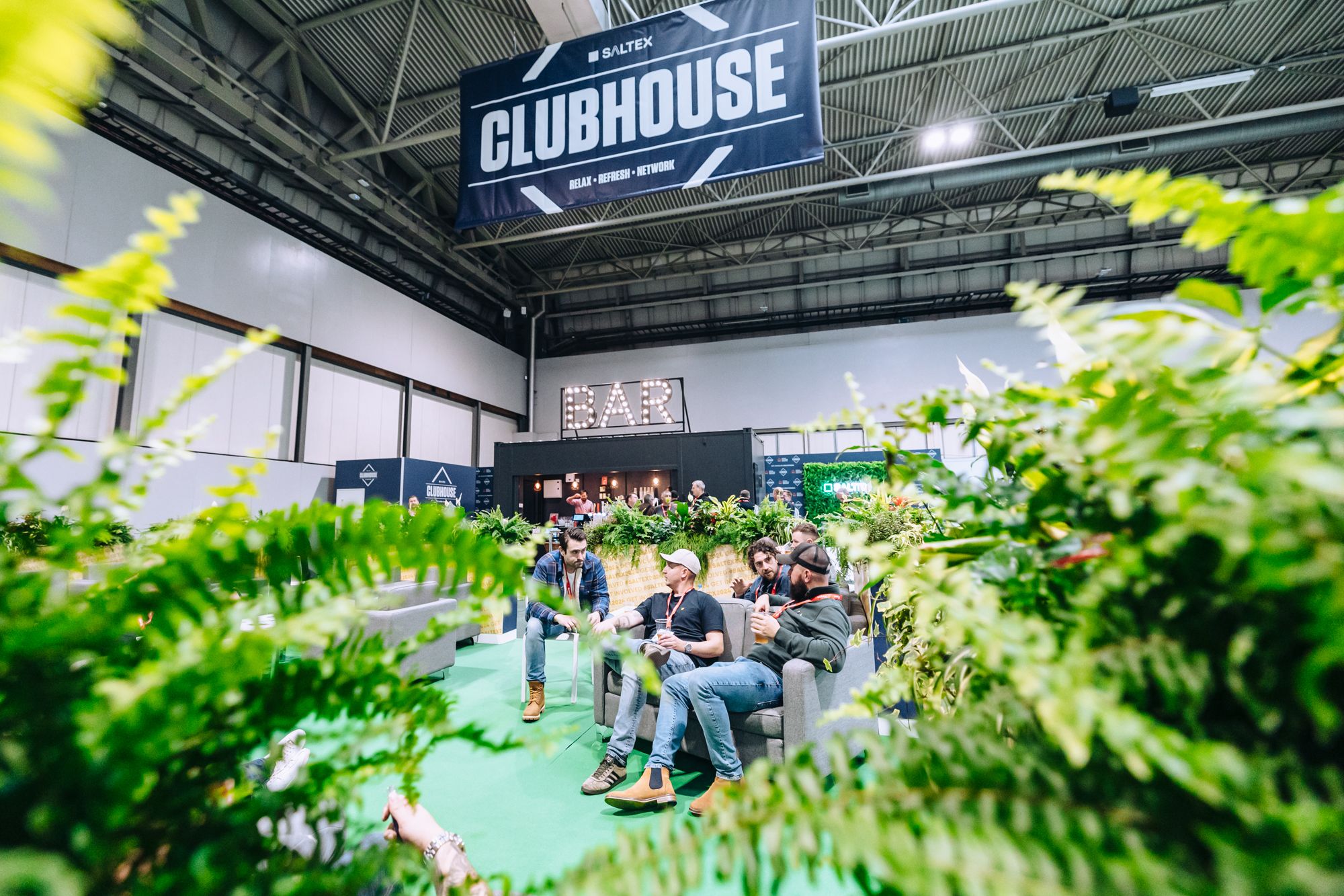 Clubhouse through foliage