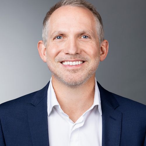 Speaker profile image for Alex Comyn