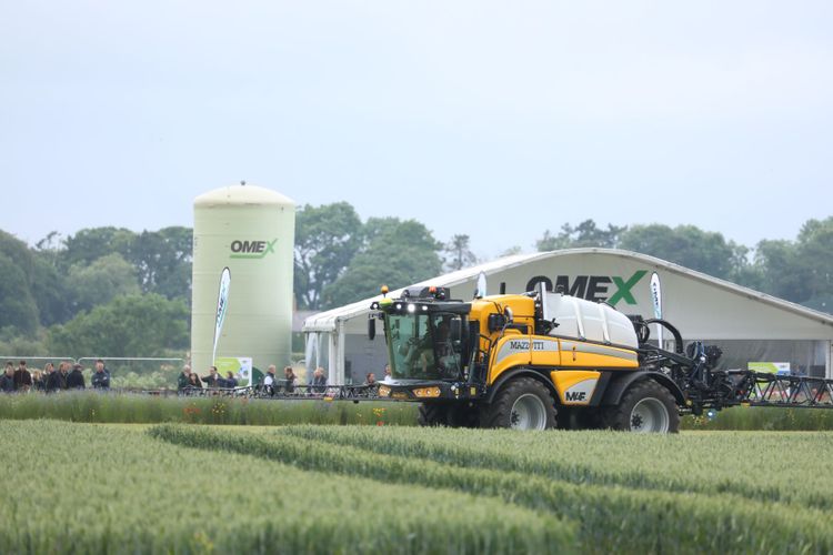Sprayer in action near Omex stand