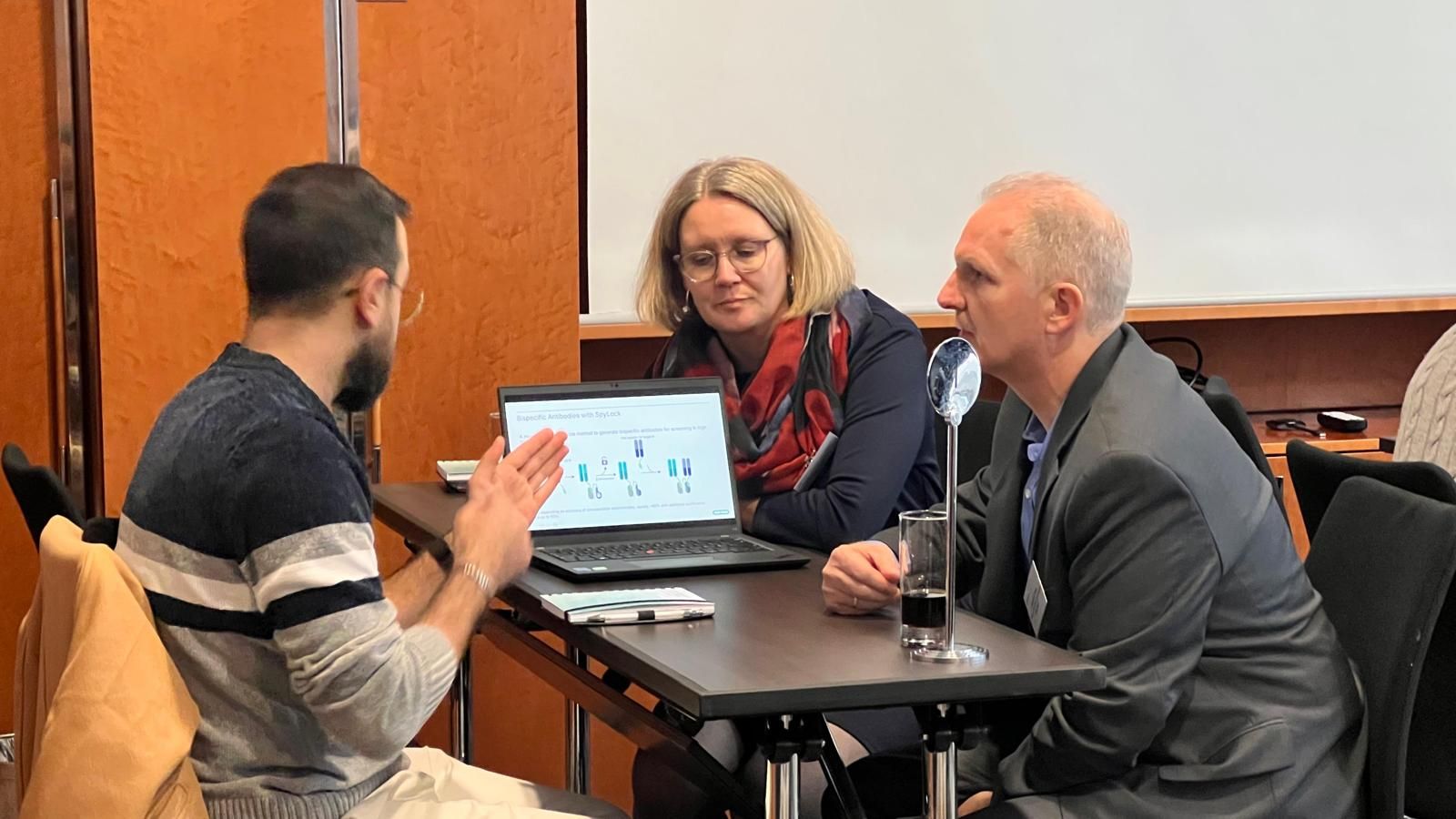 Delegates sat in a one-to-one meeting