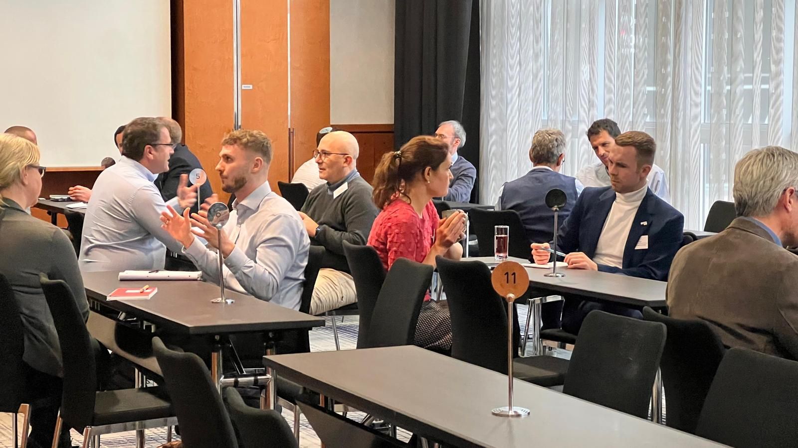 Delegates sat at one-to-one meeting, with service providers