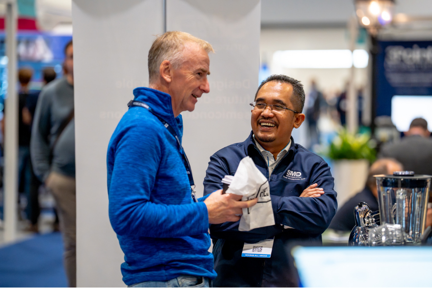 Attendees networking at Microelectronics UK