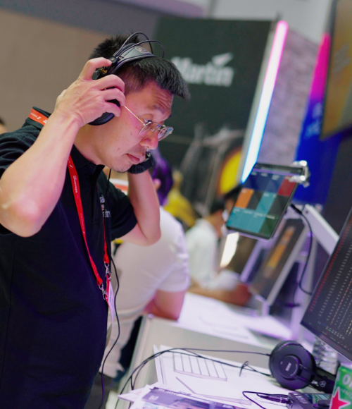 Man trying Audio at InfoComm China