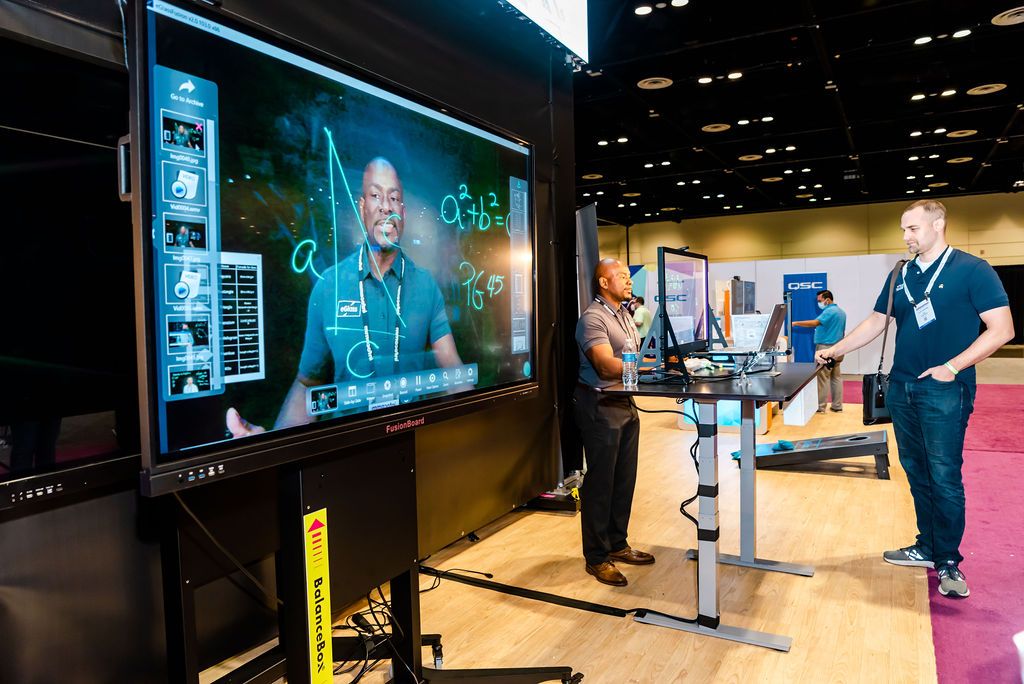 InfoComm exhibitor uses transparent interactive board for learning space